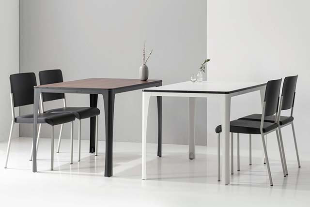Two square cafe tables with contrasting tops, slim frames and chairs.