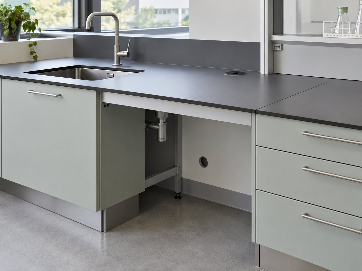 Illustrative sink bench with an open service-access bay, visible support rail, adjustable support and rear service opening.