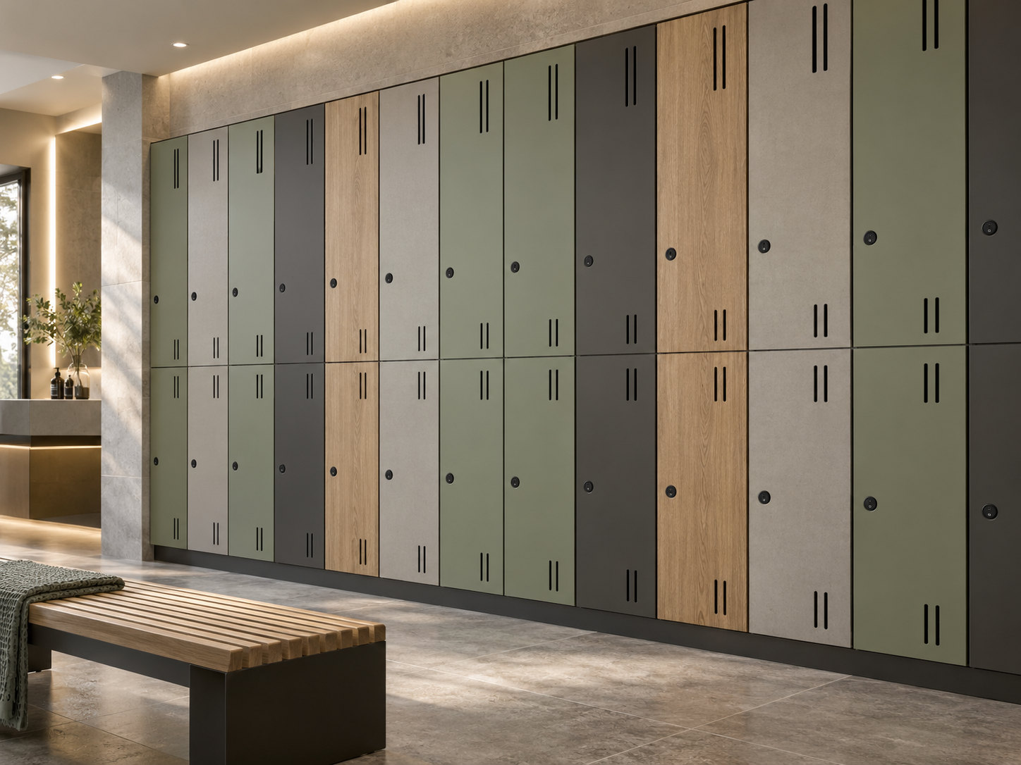 Two-tier lockers combining sage, charcoal, light grey and woodgrain doors with aligned joints and vertical ventilation slots.